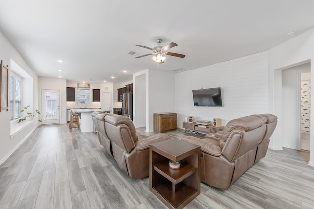 15511 Bosque Valley Ct, Cypress, TX 77433 - living area featuring light wood-type flooring, ceiling fan, recessed lighting, and baseboards