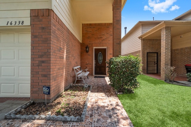 16338 N Glade, Houston, TX 77073 - doorway to property featuring brick siding and a yard