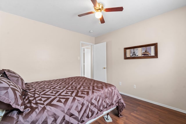 16338 N Glade, Houston, TX 77073 - bedroom with wood finished floors, baseboards, and ceiling fan