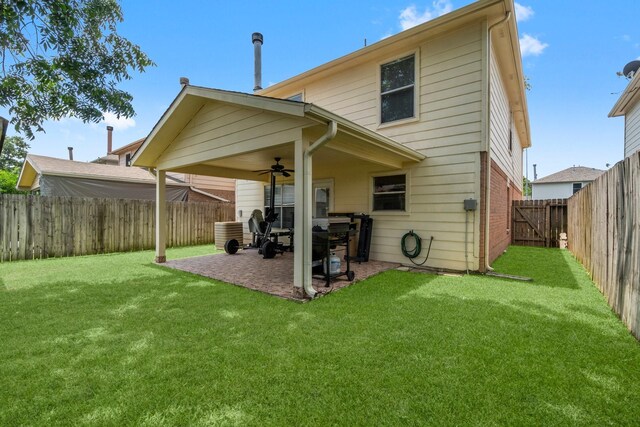 16338 N Glade, Houston, TX 77073 - rear view of house with a ceiling fan and a patio