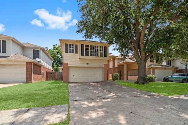 16338 N Glade, Houston, TX 77073 - view of front of home with brick siding, an attached garage, and concrete driveway