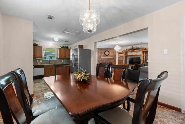 16338 N Glade, Houston, TX 77073 - dining space with a chandelier and baseboards