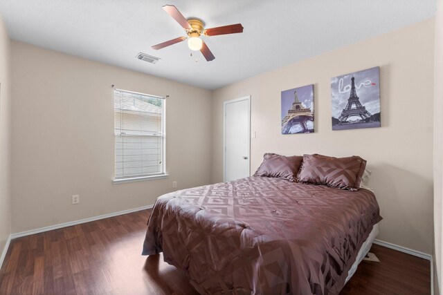 16338 N Glade, Houston, TX 77073 - bedroom with wood finished floors, baseboards, and a ceiling fan