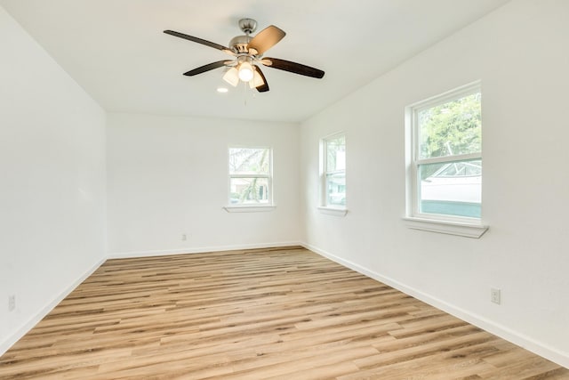 1502 W 9th St, Freeport, TX 77541 - unfurnished room with plenty of natural light, light wood finished floors, and baseboards