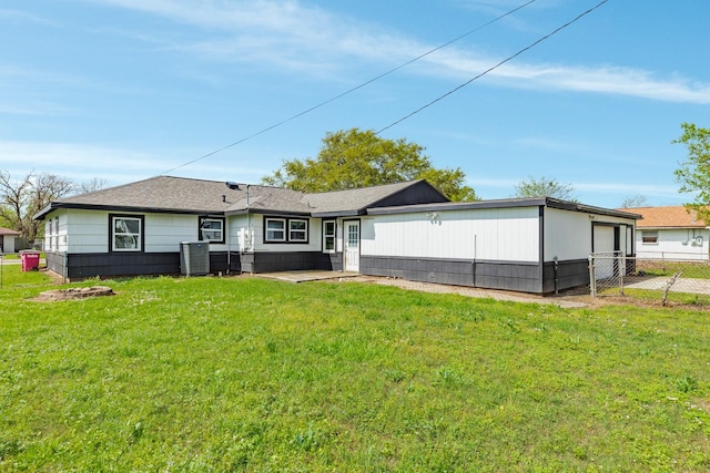 1502 W 9th St, Freeport, TX 77541 - rear view of property with central AC