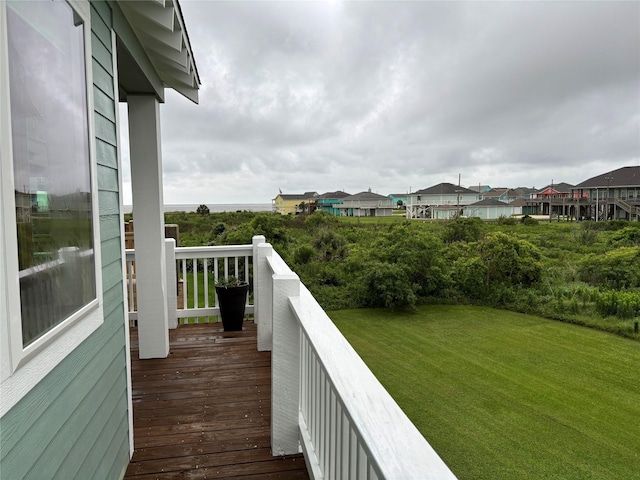 943 Sand Dune Dr, Crystal Beach, TX 77650 - deck featuring a lawn