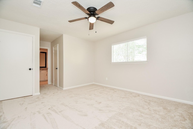 1927 Willowlake Dr, Houston, TX 77077 - empty room with light colored carpet, baseboards, and ceiling fan