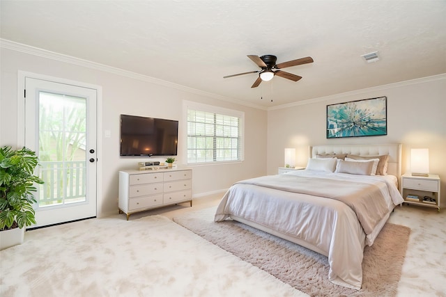 1927 Willowlake Dr, Houston, TX 77077 - bedroom with light carpet, ornamental molding, baseboards, access to exterior, and a ceiling fan