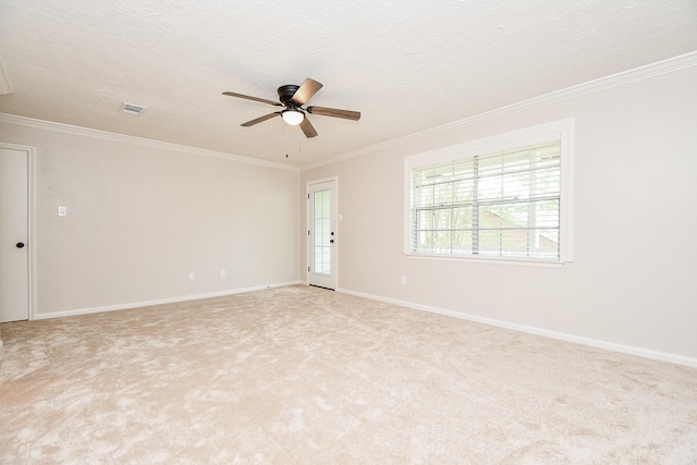 1927 Willowlake Dr, Houston, TX 77077 - empty room featuring ceiling fan, ornamental molding, light colored carpet, a textured ceiling, and baseboards