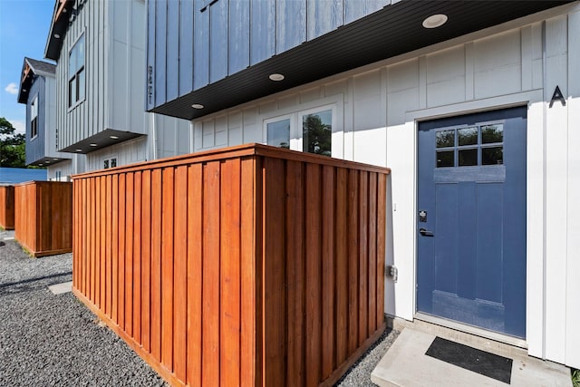 8417 Venus St Unit A B, Houston, TX 77088 - doorway to property featuring board and batten siding
