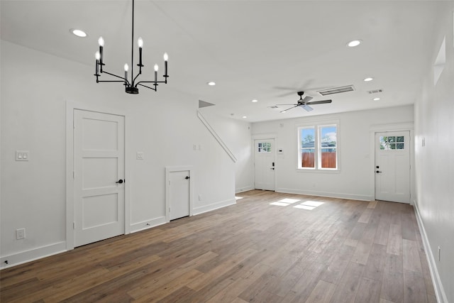 8417 Venus St Unit A B, Houston, TX 77088 - unfurnished living room with a chandelier, wood finished floors, ceiling fan, recessed lighting, and baseboards