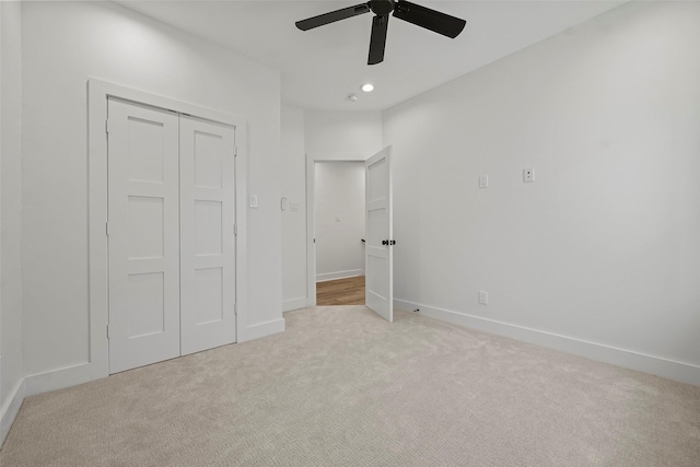 8417 Venus St Unit A B, Houston, TX 77088 - unfurnished bedroom with light carpet, baseboards, a closet, a ceiling fan, and recessed lighting