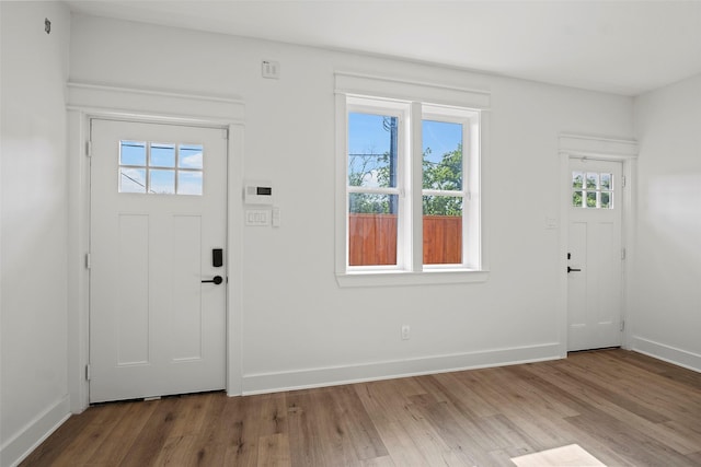 8417 Venus St Unit A B, Houston, TX 77088 - entrance foyer featuring healthy amount of natural light, wood finished floors, and baseboards