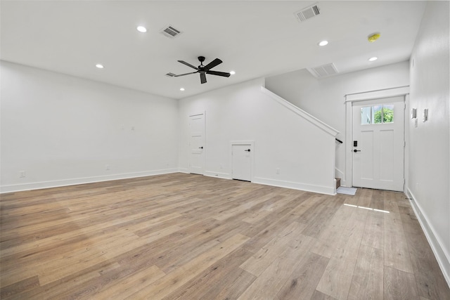 8417 Venus St Unit A B, Houston, TX 77088 - unfurnished living room featuring a ceiling fan, light wood-style flooring, recessed lighting, baseboards, and stairway