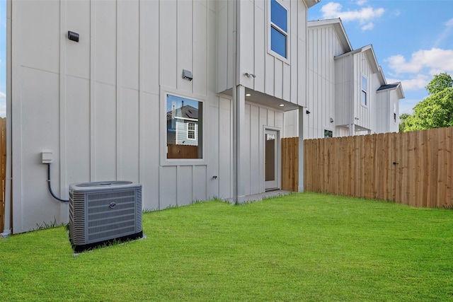 8417 Venus St Unit A B, Houston, TX 77088 - view of property exterior featuring cooling unit and board and batten siding