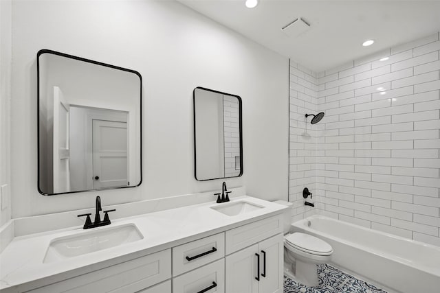 8417 Venus St Unit A B, Houston, TX 77088 - full bathroom with double vanity, toilet, washtub / shower combination, recessed lighting, and tile patterned floors