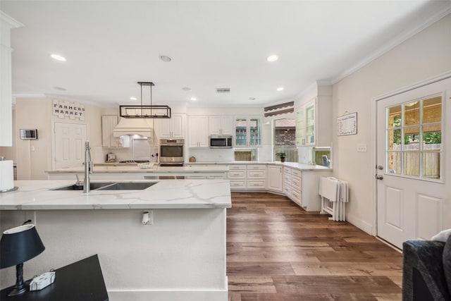 14619 Hampton Green Ln, Houston, TX 77044 - kitchen with appliances with stainless steel finishes, crown molding, a sink, dark wood-type flooring, and recessed lighting