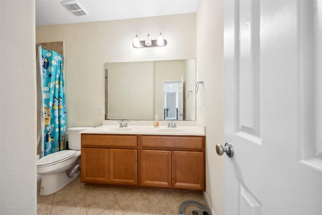 14619 Hampton Green Ln, Houston, TX 77044 - bathroom with double vanity, toilet, tile patterned floors, and a shower with shower curtain