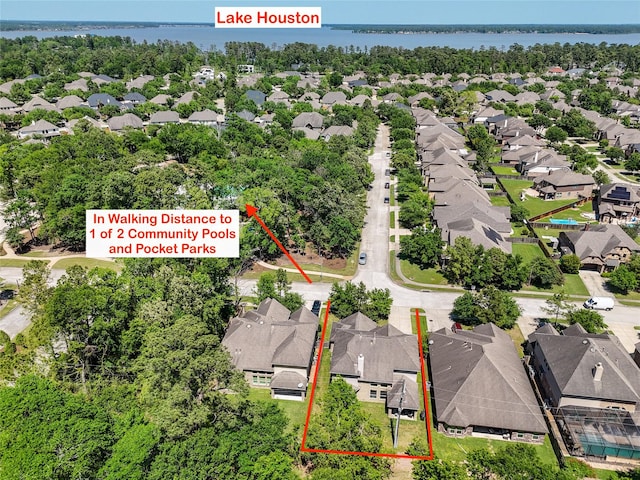 14619 Hampton Green Ln, Houston, TX 77044 - aerial view of residential area with property parcel outlined and a nearby body of water