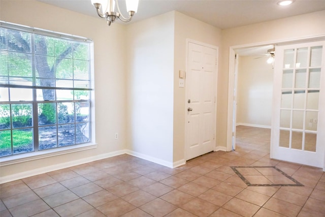 18389 Ten Oaks Ct, Porter, TX 77365 - spare room featuring tile patterned floors, a chandelier, ceiling fan, baseboards, and recessed lighting