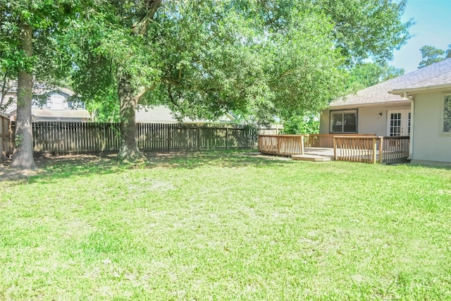 18389 Ten Oaks Ct, Porter, TX 77365 - view of yard featuring a wooden deck