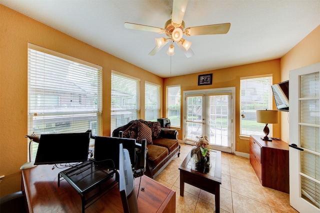 4815 N Pine Brook Way, Houston, TX 77059 - living area with ceiling fan, plenty of natural light, light tile patterned floors, and french doors