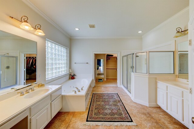 4815 N Pine Brook Way, Houston, TX 77059 - bathroom with vanity, a shower stall, a walk in closet, a garden tub, and crown molding