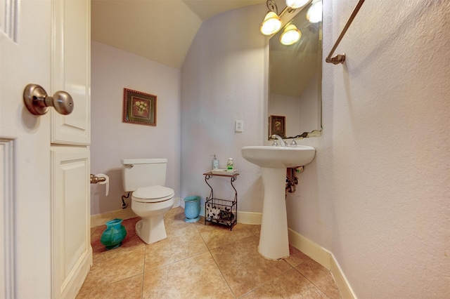 4815 N Pine Brook Way, Houston, TX 77059 - half bath featuring tile patterned flooring and vaulted ceiling