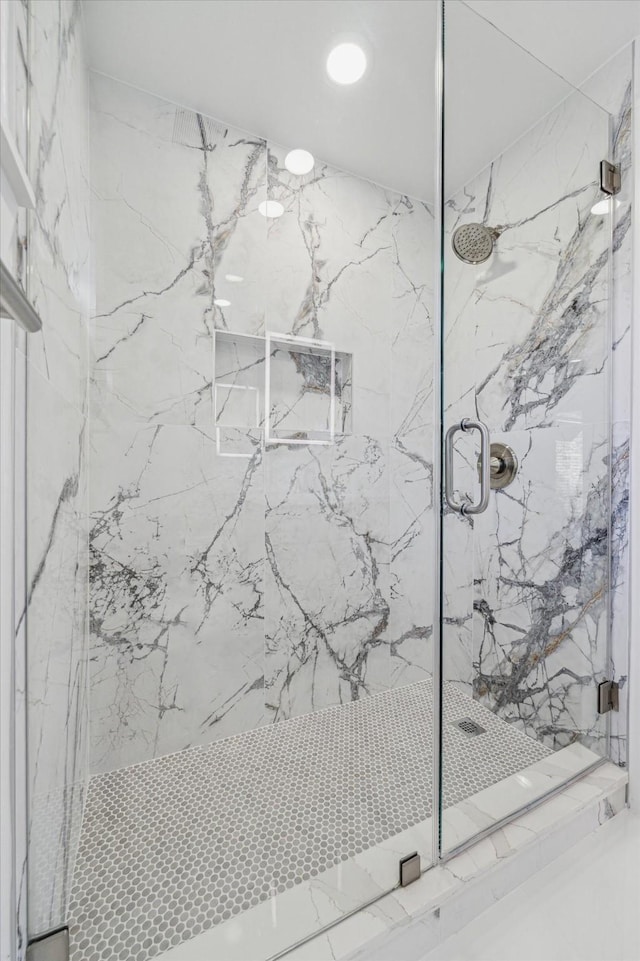 2306 Walnut Bend Ln, Houston, TX 77042 - detailed view of a marble finish shower and recessed lighting