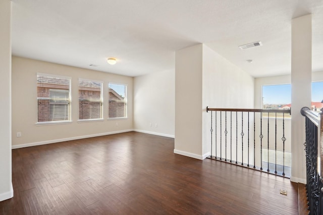 2813 Bottiglia Way, League City, TX 77573 - unfurnished room featuring dark wood finished floors and baseboards