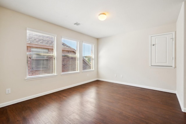 2813 Bottiglia Way, League City, TX 77573 - empty room with dark wood finished floors and baseboards