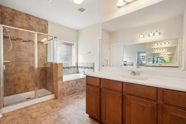 2813 Bottiglia Way, League City, TX 77573 - bathroom with a garden tub, vanity, a stall shower, and tile patterned floors