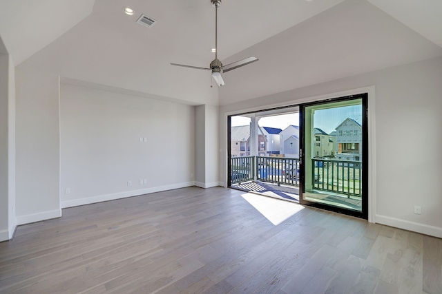 8710 Park Kolbe Ln, Houston, TX 77080 - empty room with wood finished floors, baseboards, ceiling fan, and high vaulted ceiling