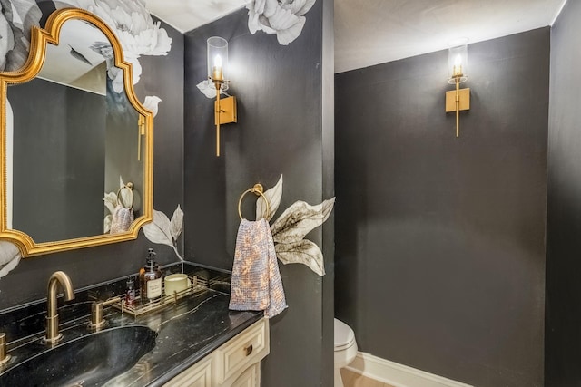 11 Twin Circle Dr, Houston, TX 77042 - half bathroom with vanity, toilet, and baseboards
