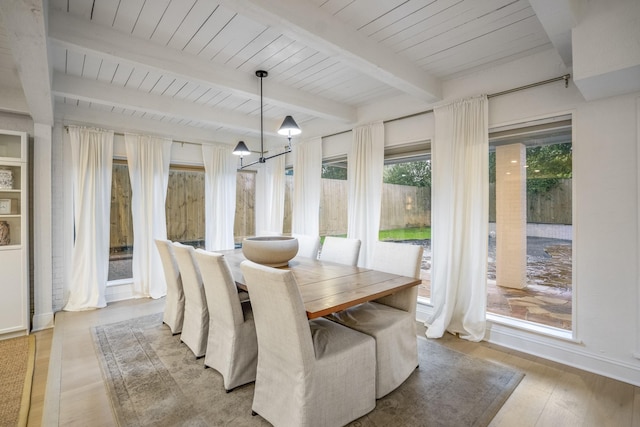 11 Twin Circle Dr, Houston, TX 77042 - dining room featuring light wood-style floors and wooden ceiling with exposed beams