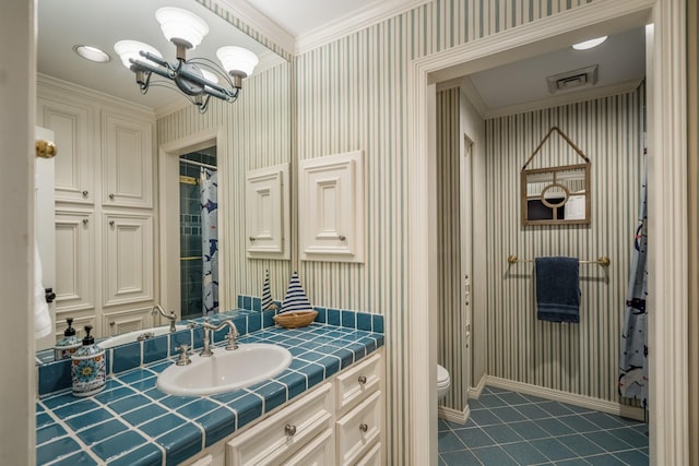 11 Twin Circle Dr, Houston, TX 77042 - full bathroom featuring vanity, crown molding, toilet, a chandelier, and baseboards