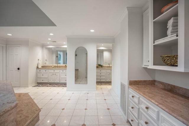 11 Twin Circle Dr, Houston, TX 77042 - full bathroom with ornamental molding, two vanities, recessed lighting, and tile patterned flooring