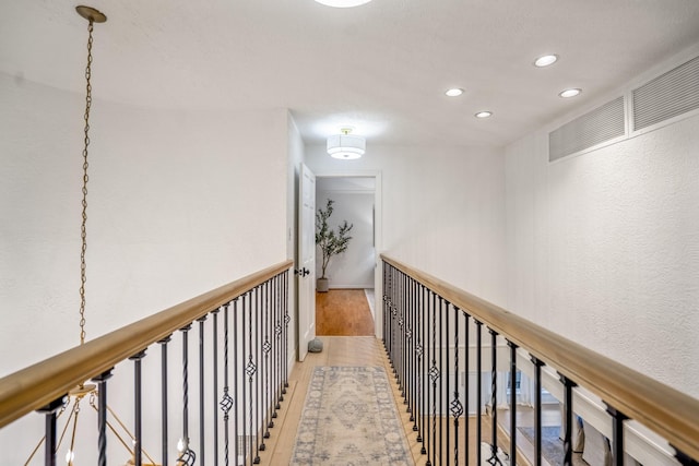 11 Twin Circle Dr, Houston, TX 77042 - hall with light wood-type flooring and recessed lighting