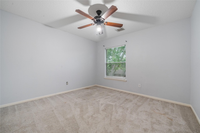 19315 Oak Station Dr, Humble, TX 77346 - empty room with carpet flooring, baseboards, and ceiling fan