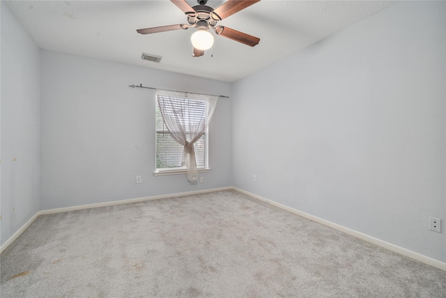 19315 Oak Station Dr, Humble, TX 77346 - unfurnished room with carpet floors, baseboards, and ceiling fan