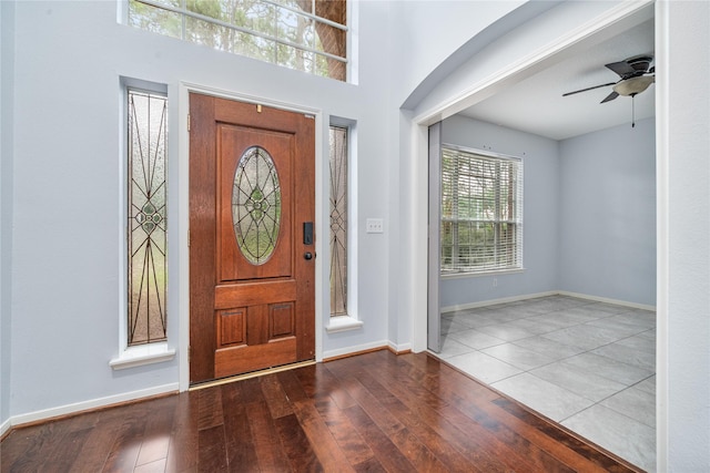 19315 Oak Station Dr, Humble, TX 77346 - entrance foyer featuring baseboards, wood-type flooring, and ceiling fan