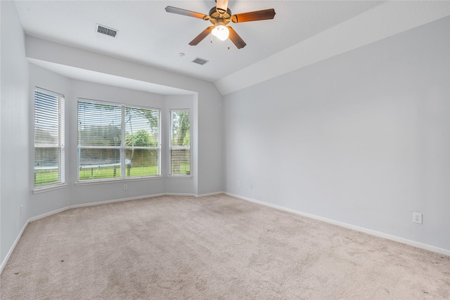 19315 Oak Station Dr, Humble, TX 77346 - carpeted spare room featuring ceiling fan, baseboards, and lofted ceiling