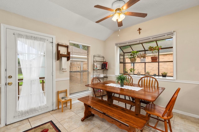 815 Millpond Dr, Sugar Land, TX 77498 - dining space featuring light tile patterned flooring, a ceiling fan, and lofted ceiling