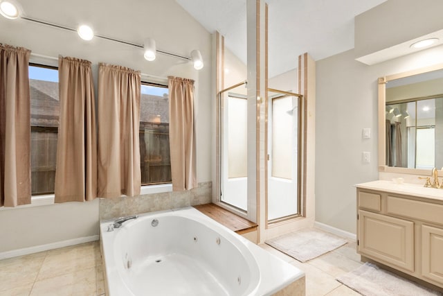 815 Millpond Dr, Sugar Land, TX 77498 - bathroom featuring a stall shower, a tub with jets, vanity, and tile patterned floors