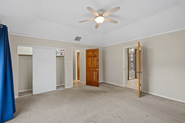 815 Millpond Dr, Sugar Land, TX 77498 - unfurnished bedroom with a tray ceiling, carpet flooring, a ceiling fan, and ornamental molding