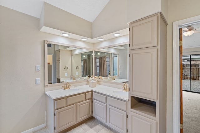 815 Millpond Dr, Sugar Land, TX 77498 - full bathroom with double vanity, lofted ceiling, and a ceiling fan