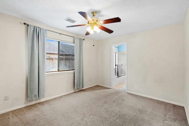 815 Millpond Dr, Sugar Land, TX 77498 - carpeted empty room with ceiling fan and a textured ceiling
