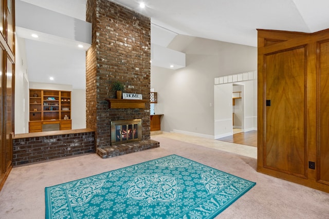 815 Millpond Dr, Sugar Land, TX 77498 - carpeted living room featuring a fireplace and high vaulted ceiling