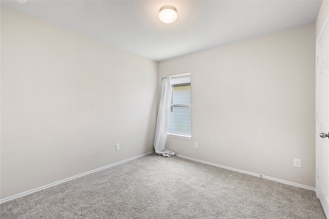 10530 Vinca Minor Ln, Houston, TX 77016 - carpeted spare room featuring baseboards