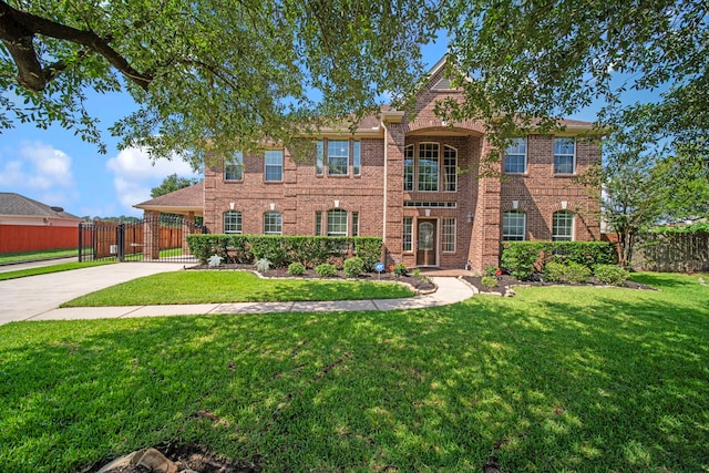 18302 Glenn Haven Estates Dr, Spring, TX 77379 - view of front of house featuring a gate, brick siding, and driveway